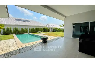 Luxurious modern home with private pool and spacious outdoor area, perfect for relaxation and entertainment.