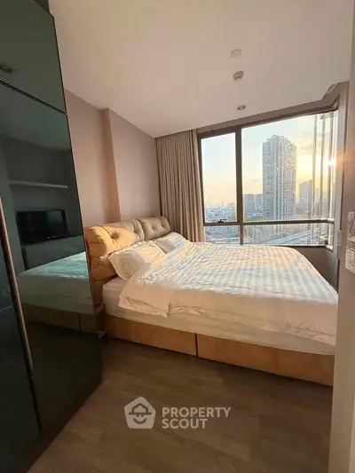 Modern bedroom with stunning city view and elegant furnishings