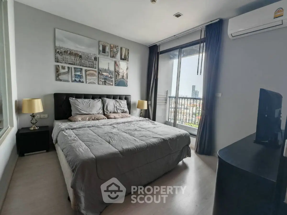 Modern bedroom with balcony view and stylish decor in urban apartment