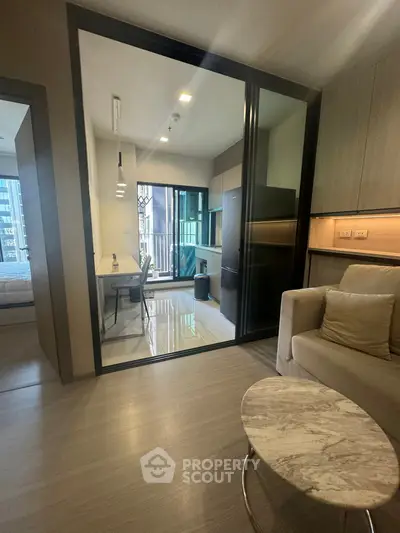 Modern apartment interior with open layout and balcony view