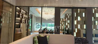 Luxurious modern living room with elegant chandelier and stylish decor