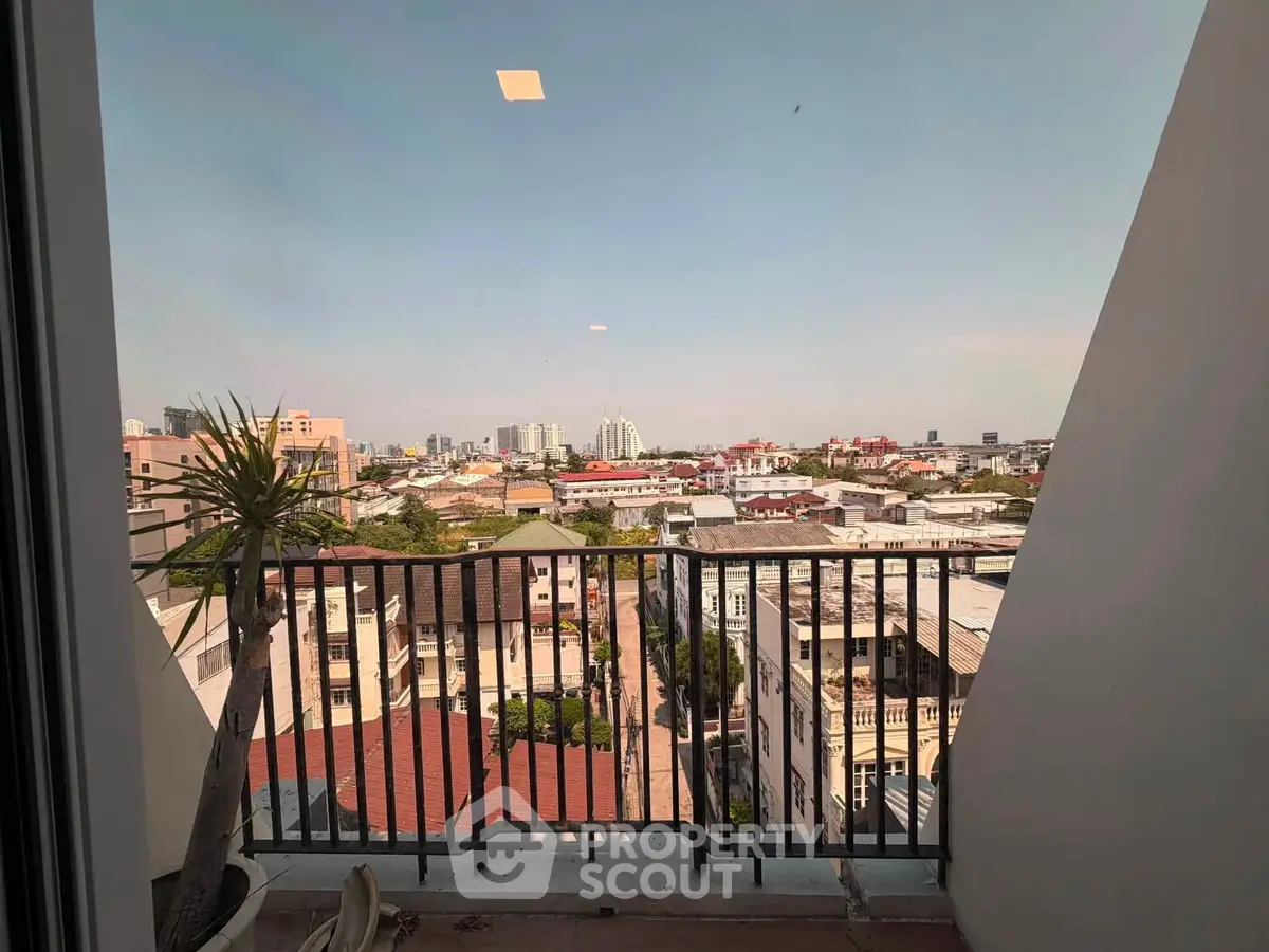 Stunning cityscape view from a modern balcony, perfect for urban living enthusiasts.