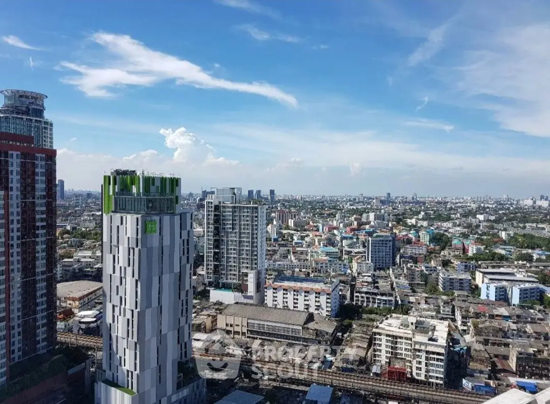 Stunning cityscape view from high-rise building showcasing urban skyline and vibrant city life.
