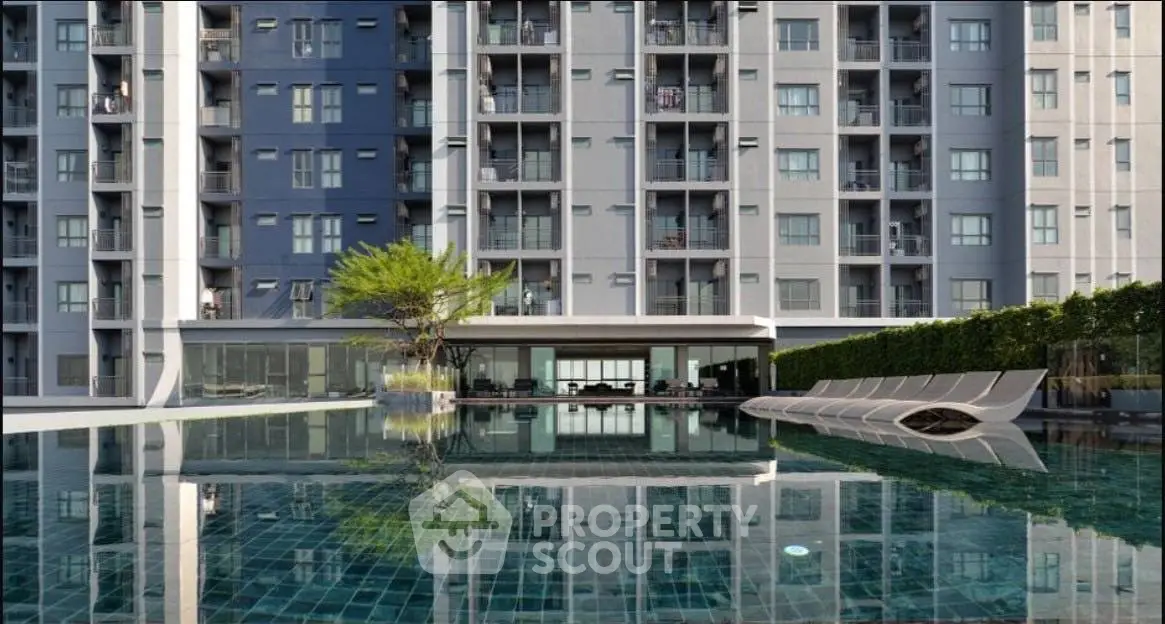 Modern condominium with luxurious pool and sleek architecture, perfect for urban living.