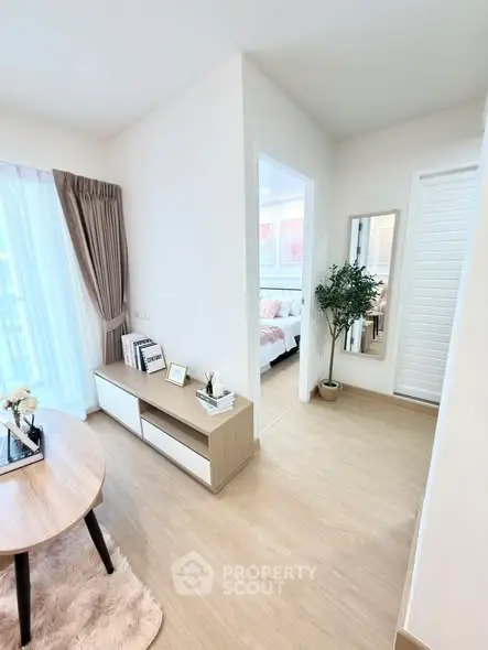 Bright and modern living space with stylish decor and natural light