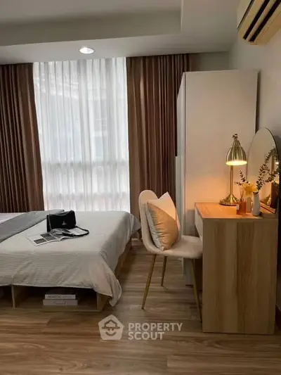 Cozy bedroom with elegant decor and natural light