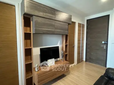 Modern living room with stylish wooden TV cabinet and sleek design