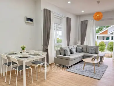 Modern living room with stylish decor and dining area in open layout