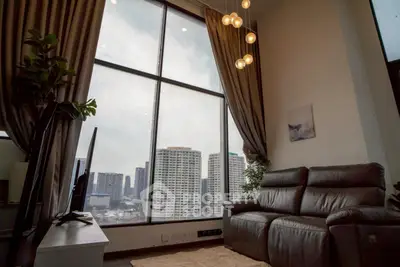 Luxurious living room with stunning city view and modern decor