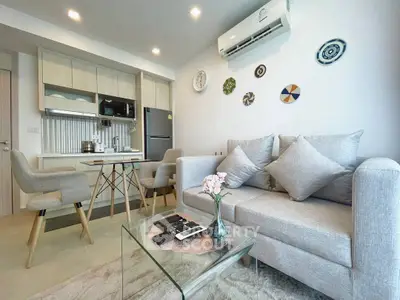 Modern living room with cozy sofa and stylish decor in a contemporary apartment.