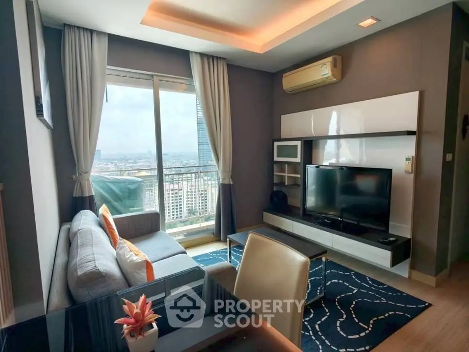 Modern living room with city view, stylish furniture, and natural light.