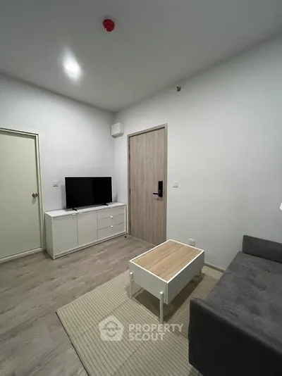 Modern living room with sleek furniture and minimalist design