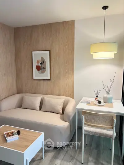 Cozy modern living room with stylish decor and elegant lighting