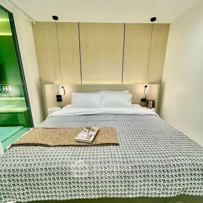 Modern bedroom with stylish decor and cozy ambiance