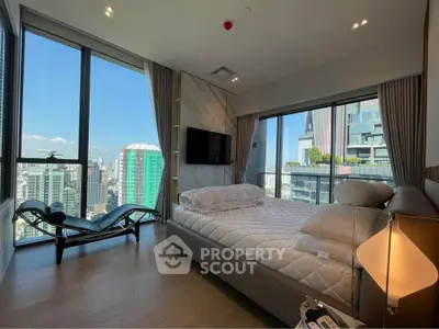 Luxurious bedroom with stunning city view and modern furnishings