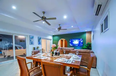 Spacious living room with elegant dining area and modern decor