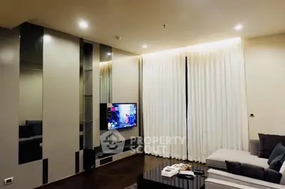 Modern living room with sleek design and cozy ambiance