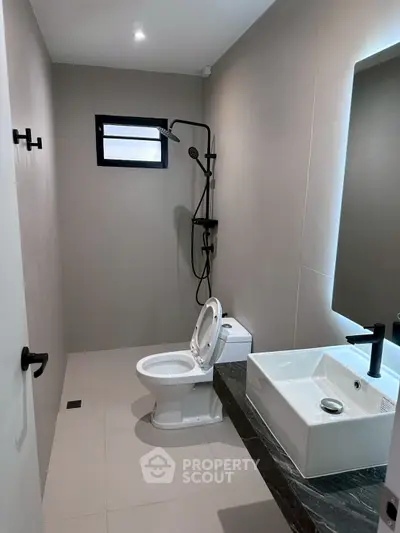 Modern bathroom with sleek fixtures and minimalist design