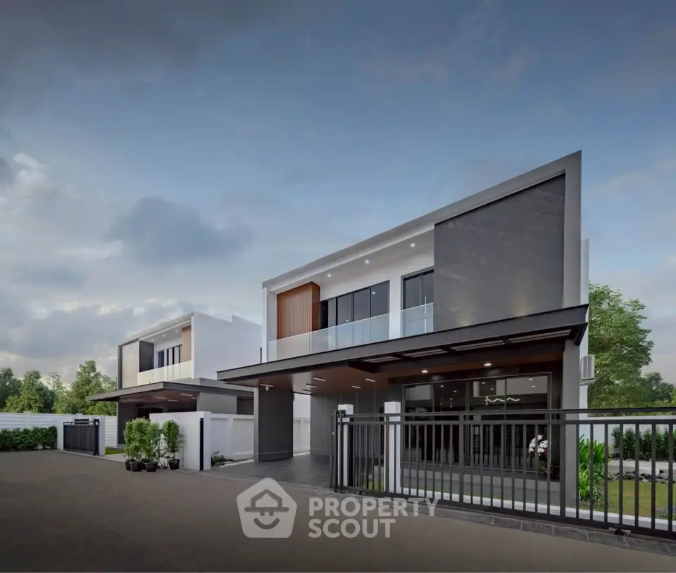 Modern two-story house with sleek design and spacious driveway in a serene neighborhood.