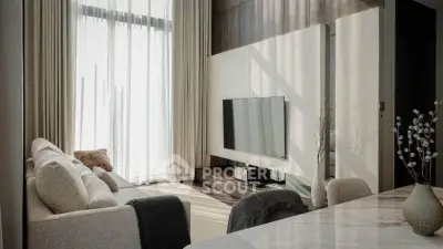 Modern living room with large windows and stylish decor