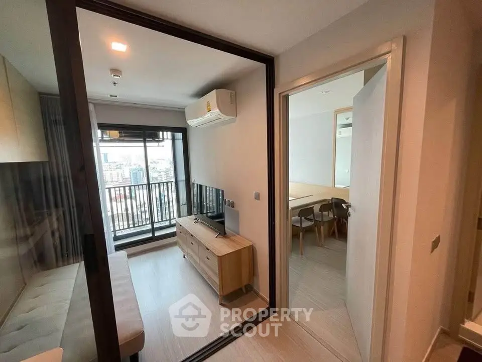 Modern apartment interior with living room and balcony view