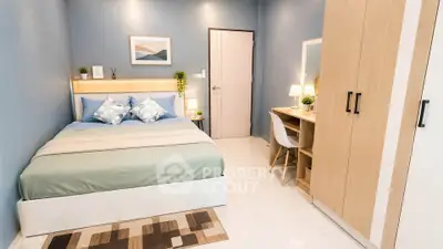Modern bedroom with stylish decor, cozy bed, and elegant furniture in a serene setting.