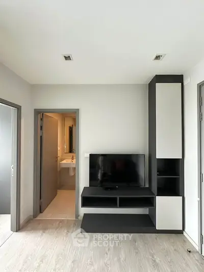 Modern living room with sleek TV stand and minimalist decor