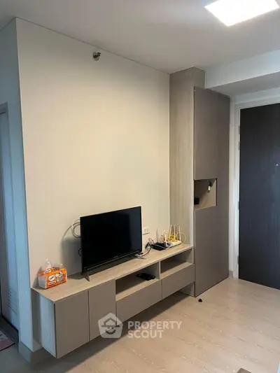 Modern living room with sleek TV stand and minimalist decor