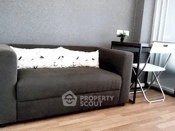 Cozy living room with modern sofa and stylish decor