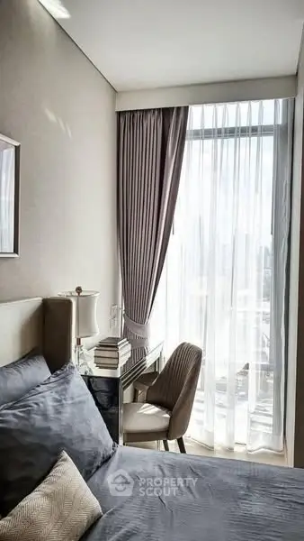 Elegant bedroom with natural light and modern decor