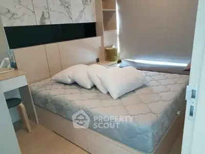 Modern bedroom with stylish decor and comfortable bed