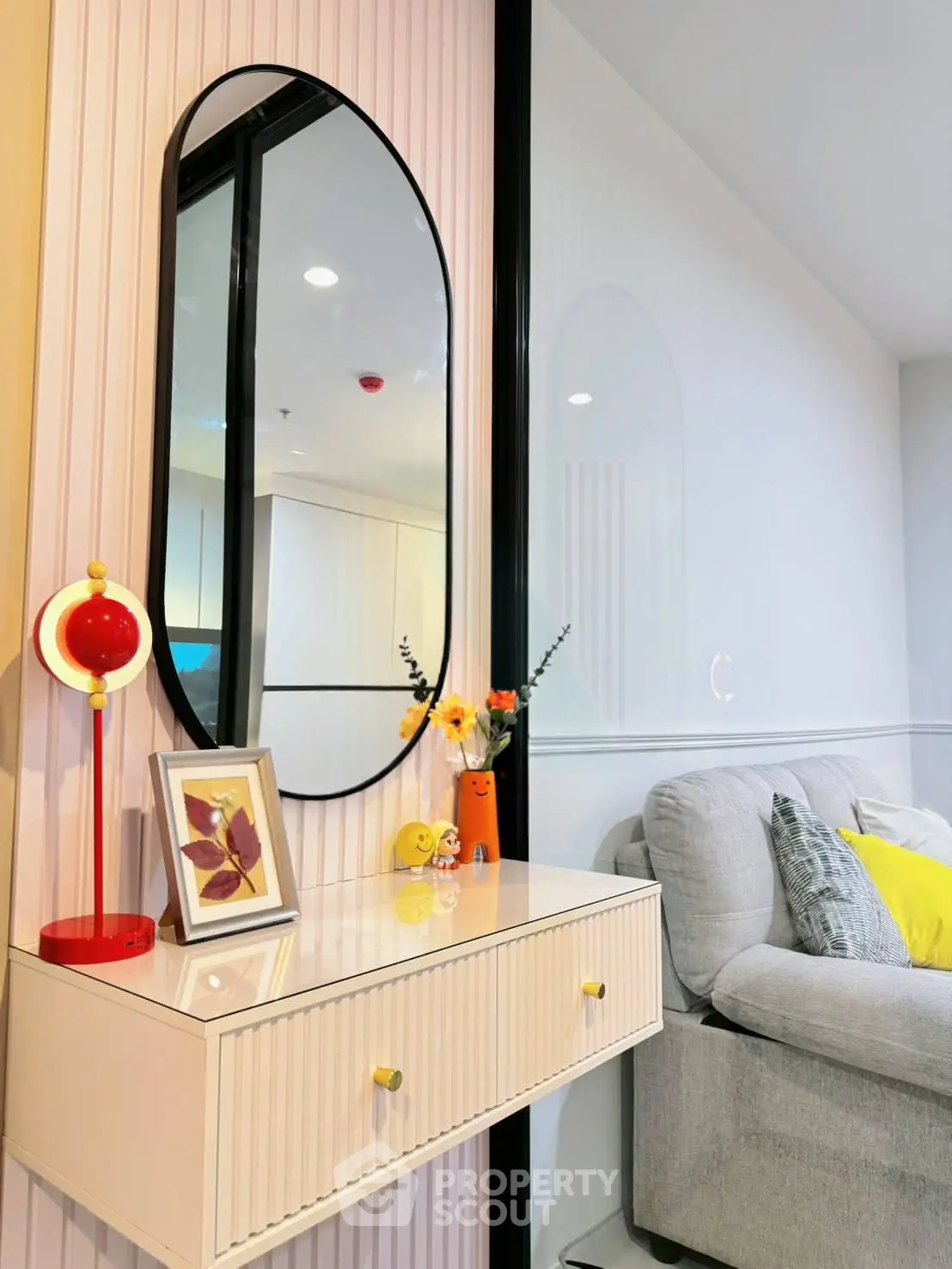 Stylish modern living room with chic decor and elegant mirror