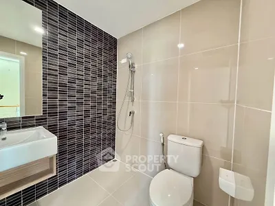 Modern bathroom with sleek tiles and contemporary fixtures