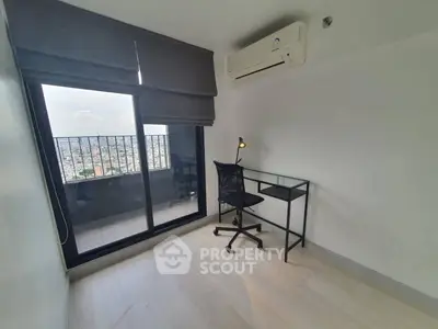 Modern study room with balcony view and sleek furniture