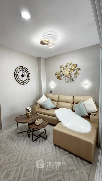 Stylish living room with modern decor and cozy seating area.