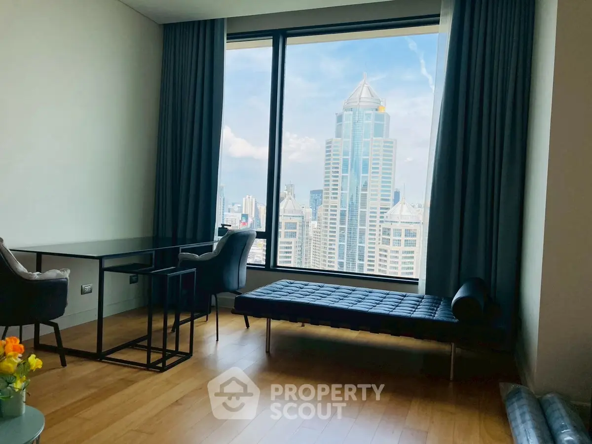 Modern living room with stunning city view and sleek furniture