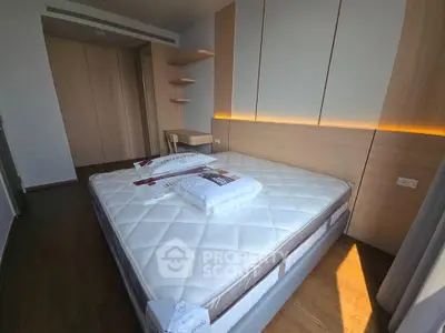 Modern bedroom with stylish wooden accents and cozy lighting