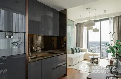 Sleek modern kitchen with high-end appliances seamlessly transitions to a cozy living area with abundant natural light and city views.