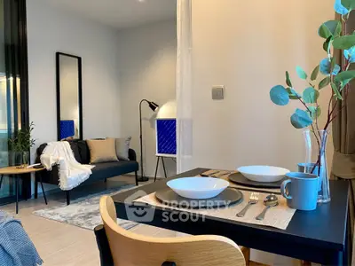 Modern living room with cozy dining area and stylish decor