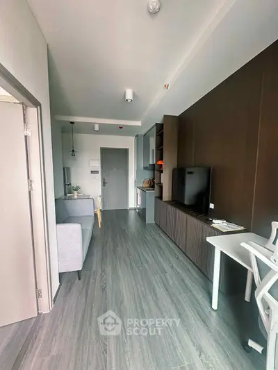 Modern apartment interior with sleek design and stylish furniture, featuring a cozy living area and contemporary decor.