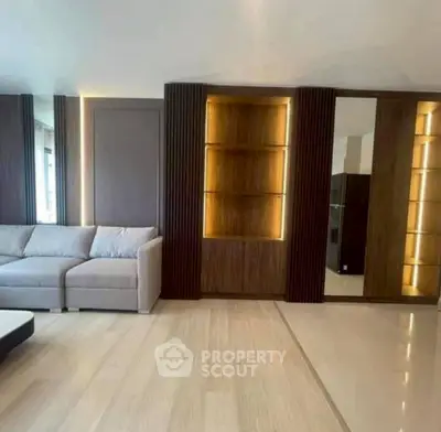 Modern living room with sleek design and ambient lighting