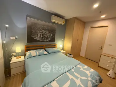 Cozy bedroom with modern decor and ample storage space
