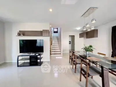 Spacious modern living room with dining area and stylish decor