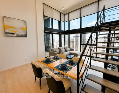 Stunning modern duplex with floor-to-ceiling windows and city views, featuring a stylish dining area and open staircase.