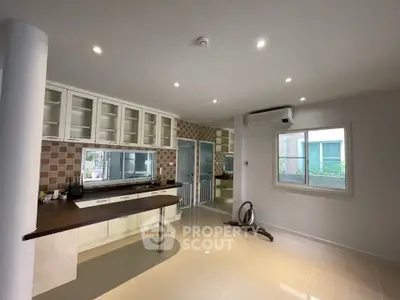 Spacious modern kitchen with open layout and sleek design