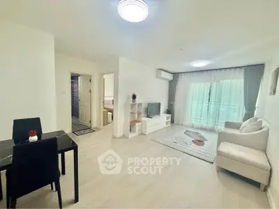 Spacious modern living room with elegant decor and natural light