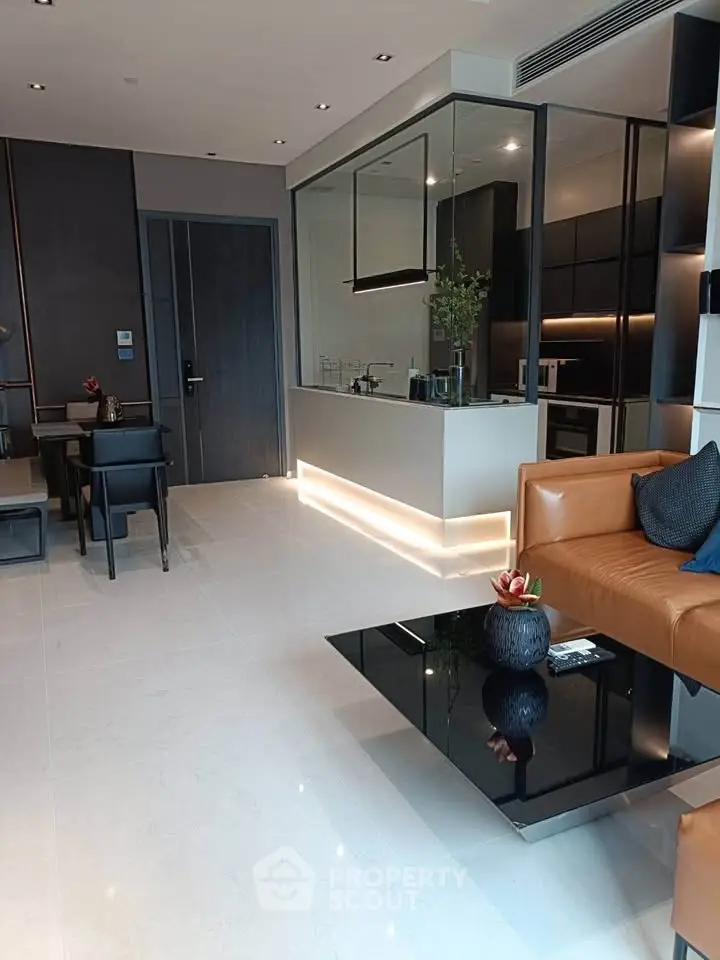 Luxurious modern living room with open kitchen and elegant decor