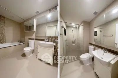 Modern bathroom with bathtub and glass shower enclosure, sleek design and neutral tones.