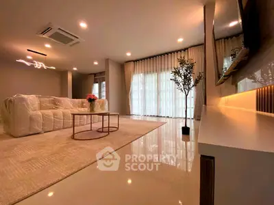 Spacious modern living room with elegant decor and natural light