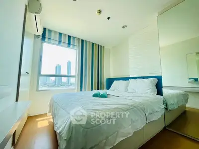 Bright modern bedroom with city view and stylish decor